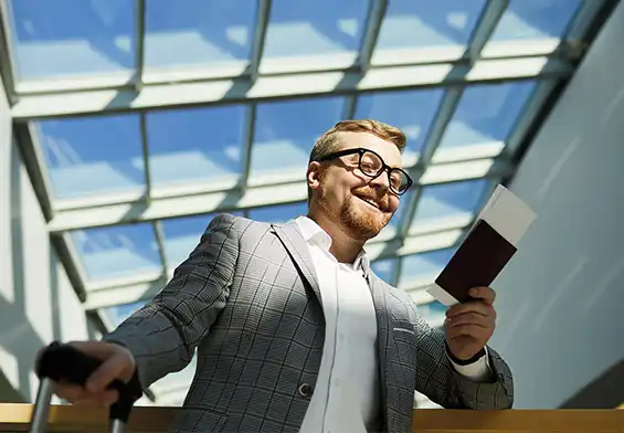 Content traveler at airport, using efficient Amer Center visa services for smooth travel.